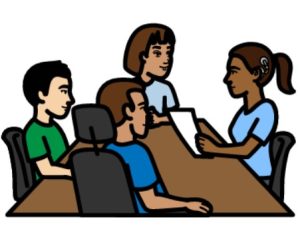 Cartoon drawing of 4 people sitting around a table having a meeting. There are 2 men and 2 women. One of the women has a hearing aid.